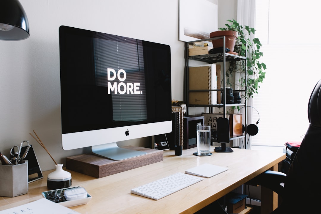 My current desk setup as of 2016. I am a wedding and portrait photographer and have always believed the space you do work in has a big impact on the quality and kind of work you complete. I have been refining my workspace since I was in high school and I am really happy where it is now! by Health Facts silver iMac with keyboard and trackpad inside room
